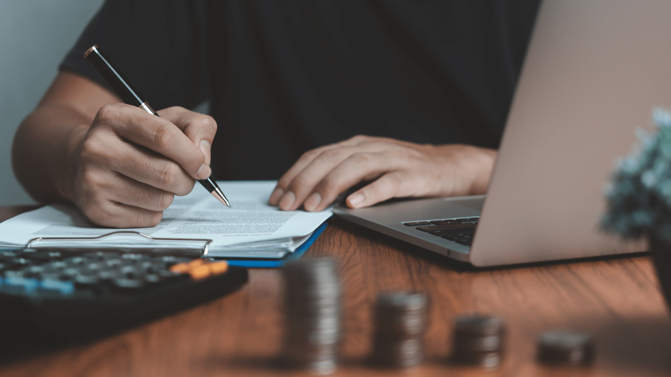 Person calculating which fund offers the best returns